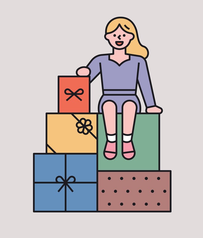 girl sitting on presents 