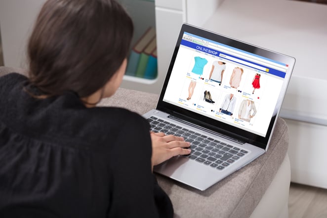 Girl buying clothes on her computer